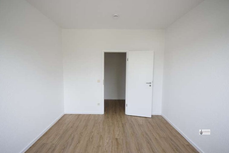 Schlafzimmer 1 mit Zimmertür