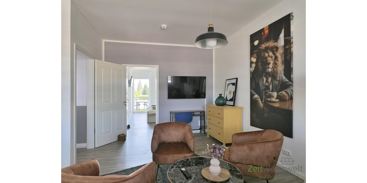Blick zu TV und hinterem Schlafzimmer
