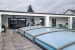 Modernes luxuriöses Wohnhaus, Bungalowstil, mit Außenpool, in schöner Stadtrandlage - Einfamilienhaus Homburg | Angebot:14540143