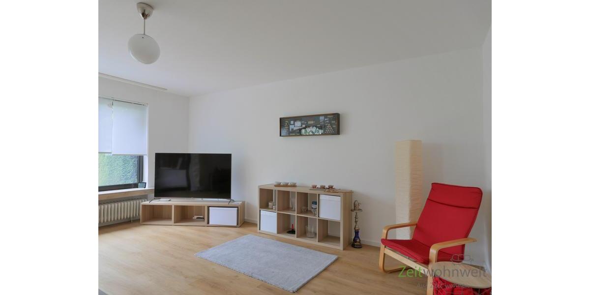 Blick zu TV, Sideboard uns Sessel