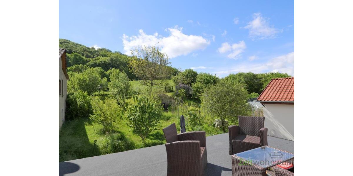 Gartenbusblick von Dachbalkon