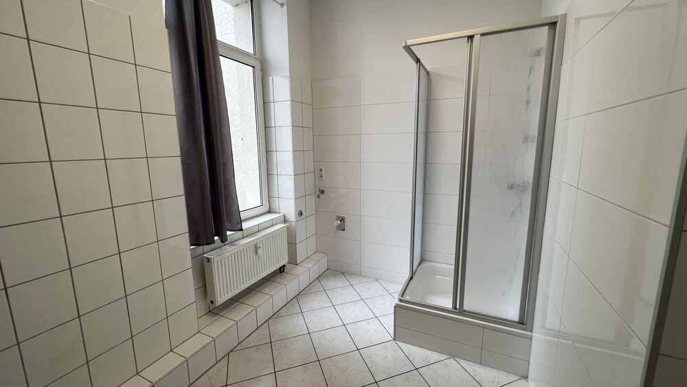 Bad mit Dusche und WB