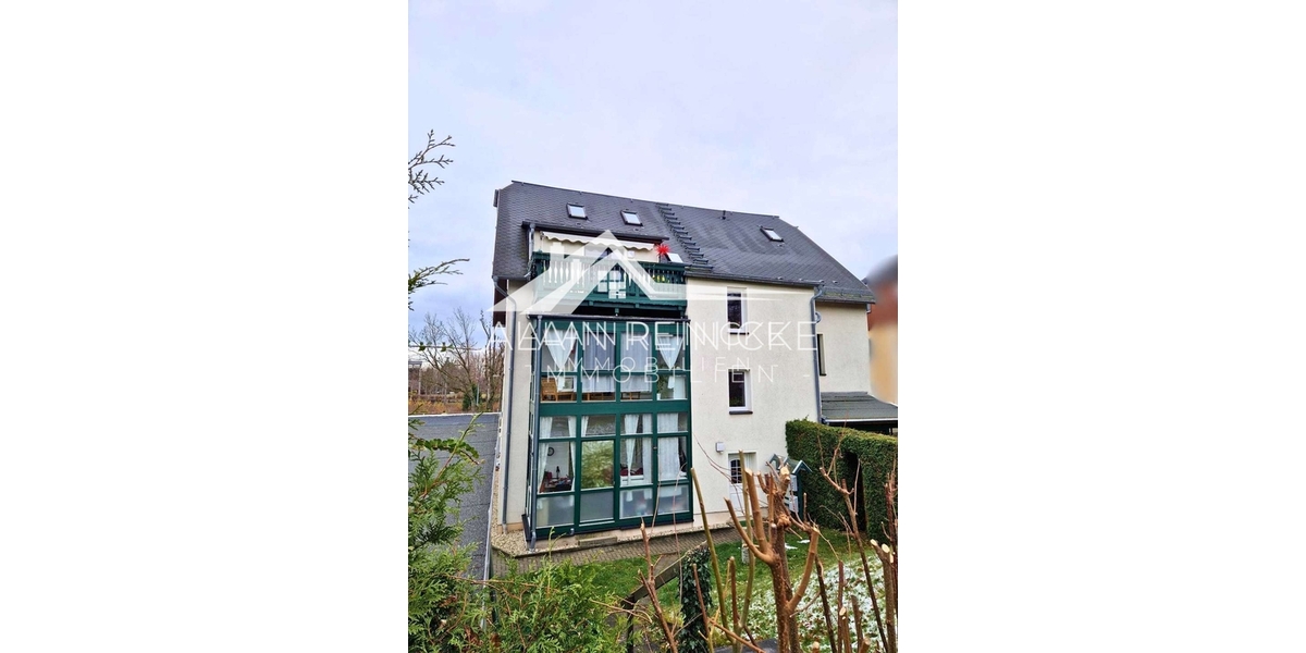 Hausansicht Rückseite mit Wintergarten