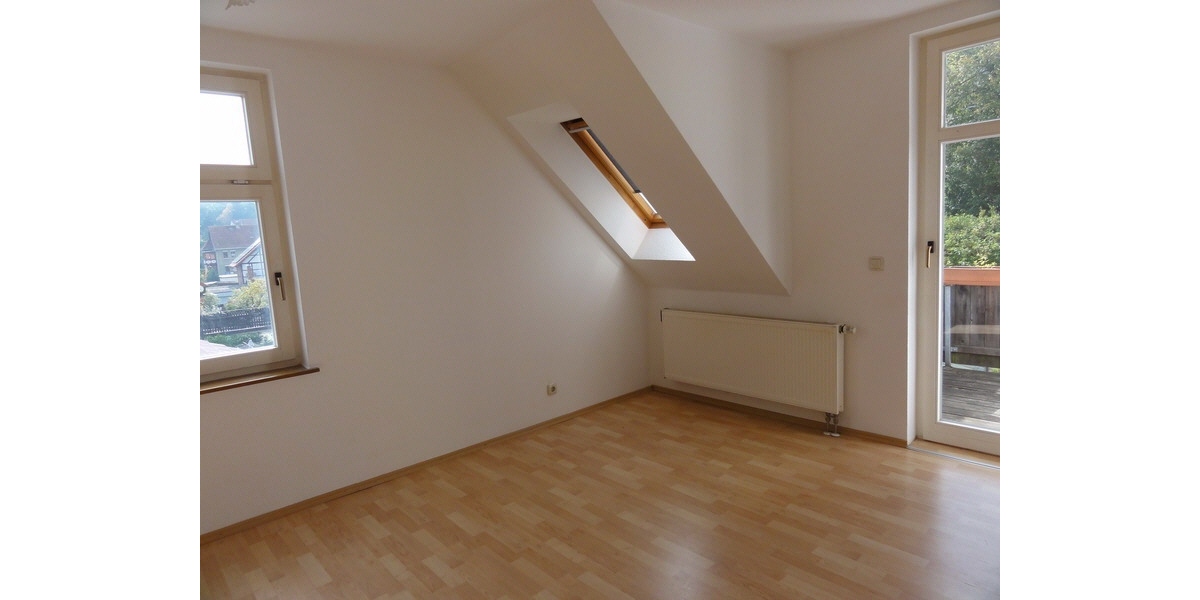 Wohnzimmer mit Balkon