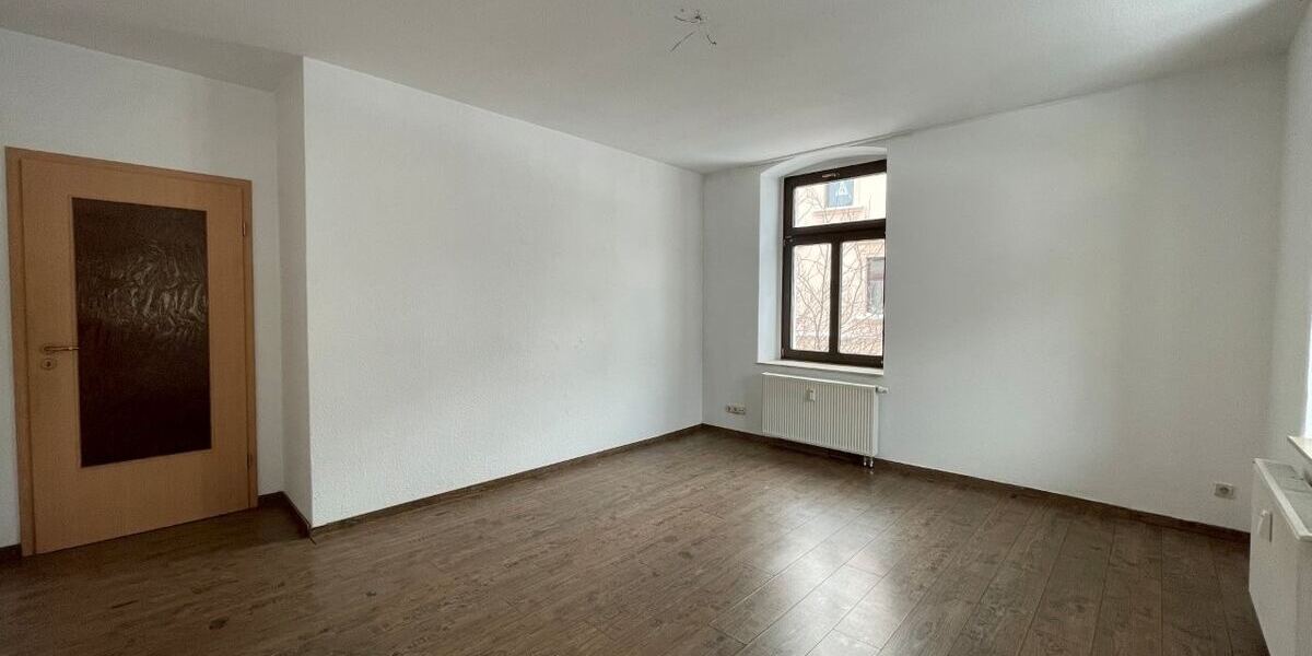 Wohnzimmer mit Balkon WE 3