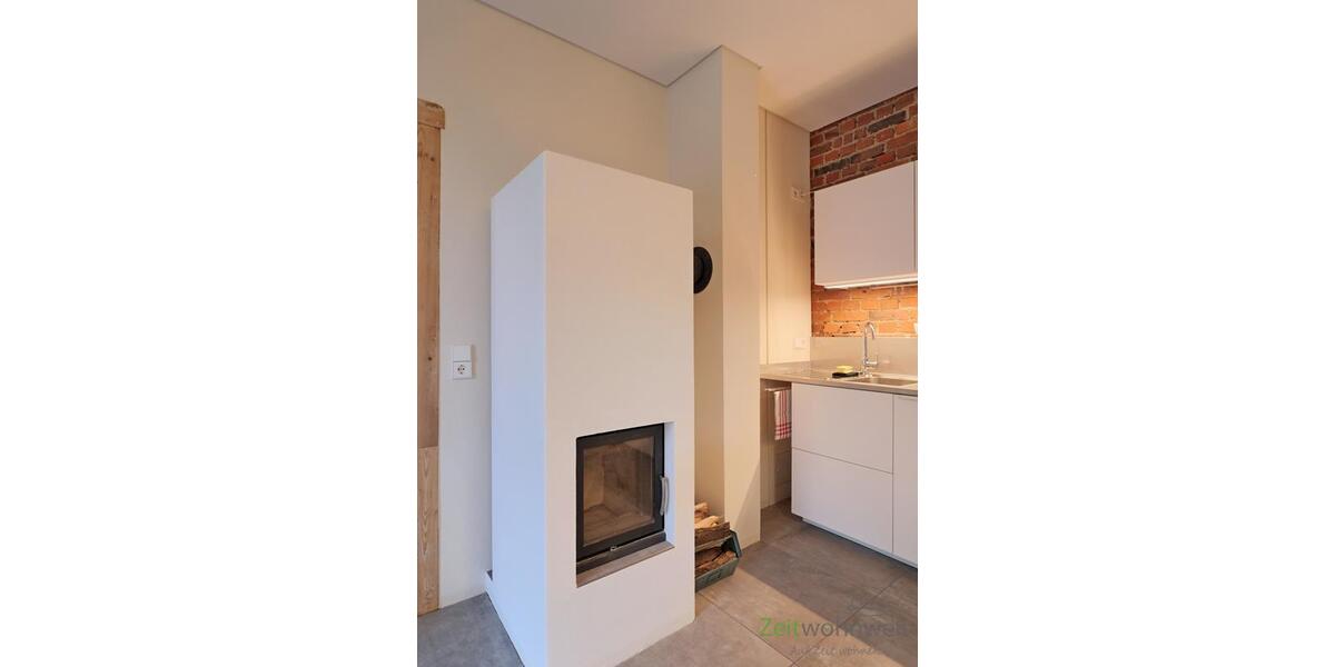 echter Kamin im Wohnzimmer