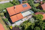 Wohnen im Grünen - Charmantes Holzhaus mit Wintergarten, Galerie und idyllischem Garten - Einfamilienhaus Neukirchen beim Heiligen Blut | Angebot:26948792
