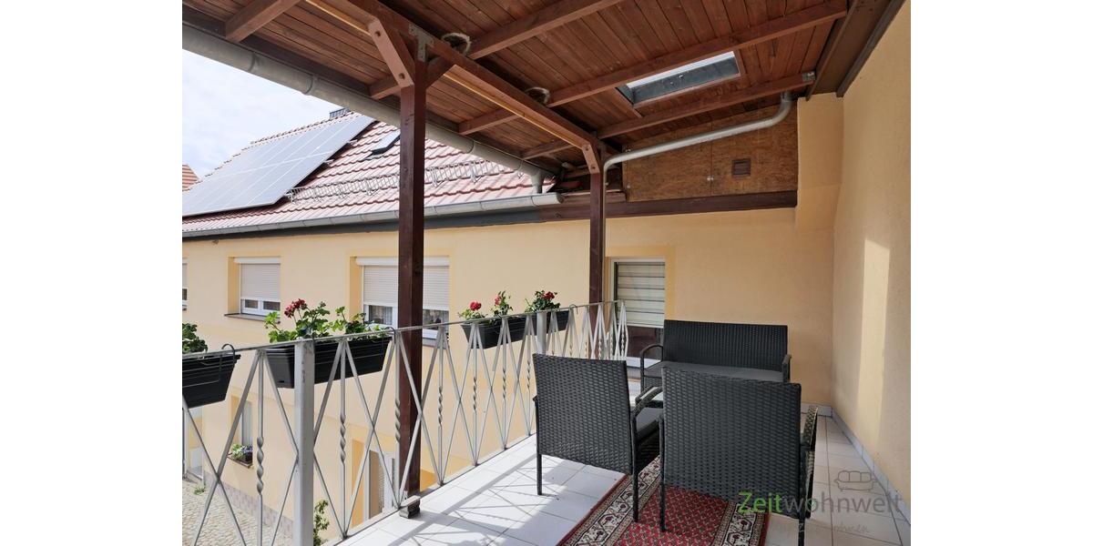 überdachter Balkon zum Innenhof