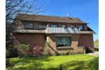 Interessantes Wohnhaus mit 2 Wohnungen, Nebengebäude und Grünland - Einfamilienhaus Stolzenau | Angebot:27142431