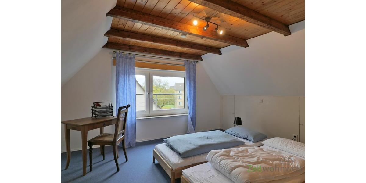 Dachzimmer moit Gästebetten