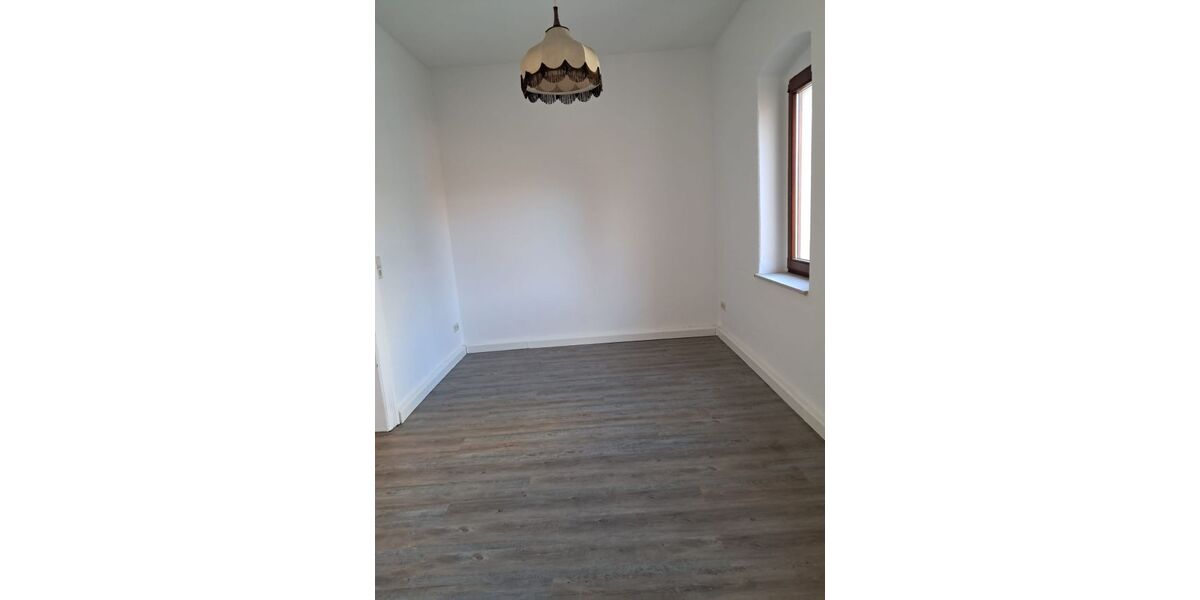 Esszimmer mit anschließendem Küchenbereich