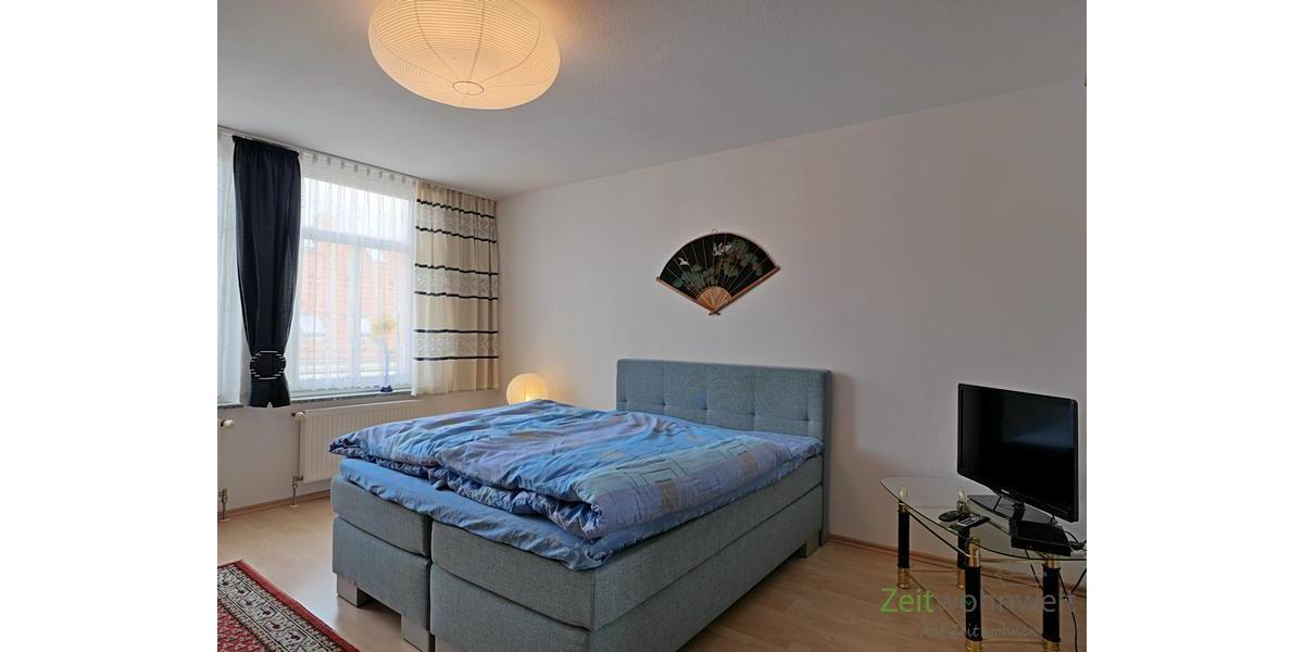Doppelbett und TV