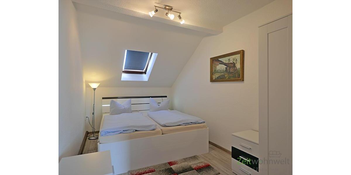 Schlafzimmer mit Kleiderschrank