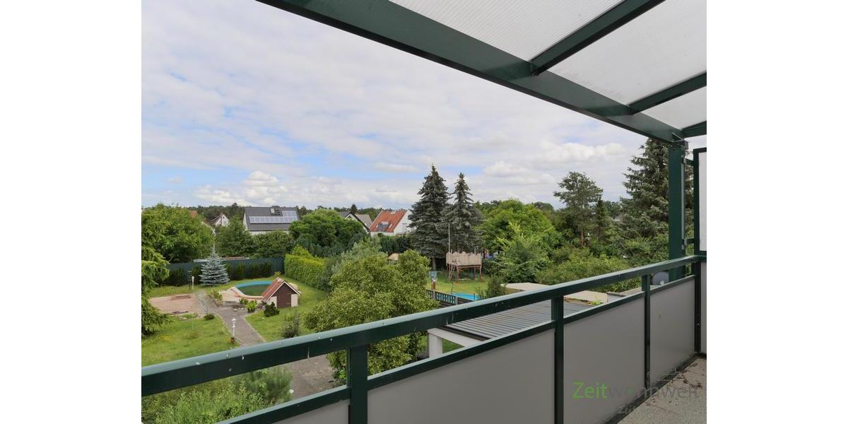 überdachter Balkon zum Garten