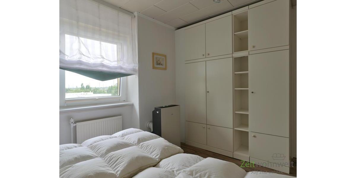 Klimagerät und Kleiderschrank