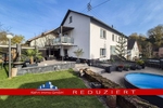 Großzügiges Wohnen für zwei Generationen: Poolbereich mit Poolbar und barrierefreiem EG - Zweifamilienhaus Katzweiler | Angebot:27159280