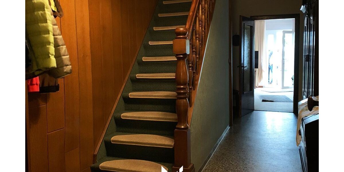  Treppenaufgang in die Obergeschosswohnung