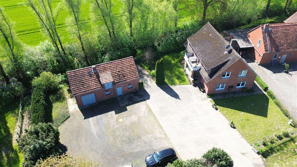Interessantes Wohnhaus mit 2 Wohnungen, Nebengebäude und Grünland - Einfamilienhaus Stolzenau | Angebot:27021703