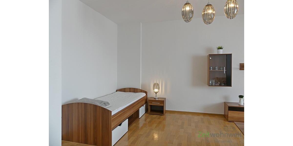 Bett imm Wohnzimmer