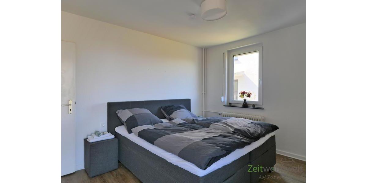 Doppelbett im hinteren Schlafzimmer