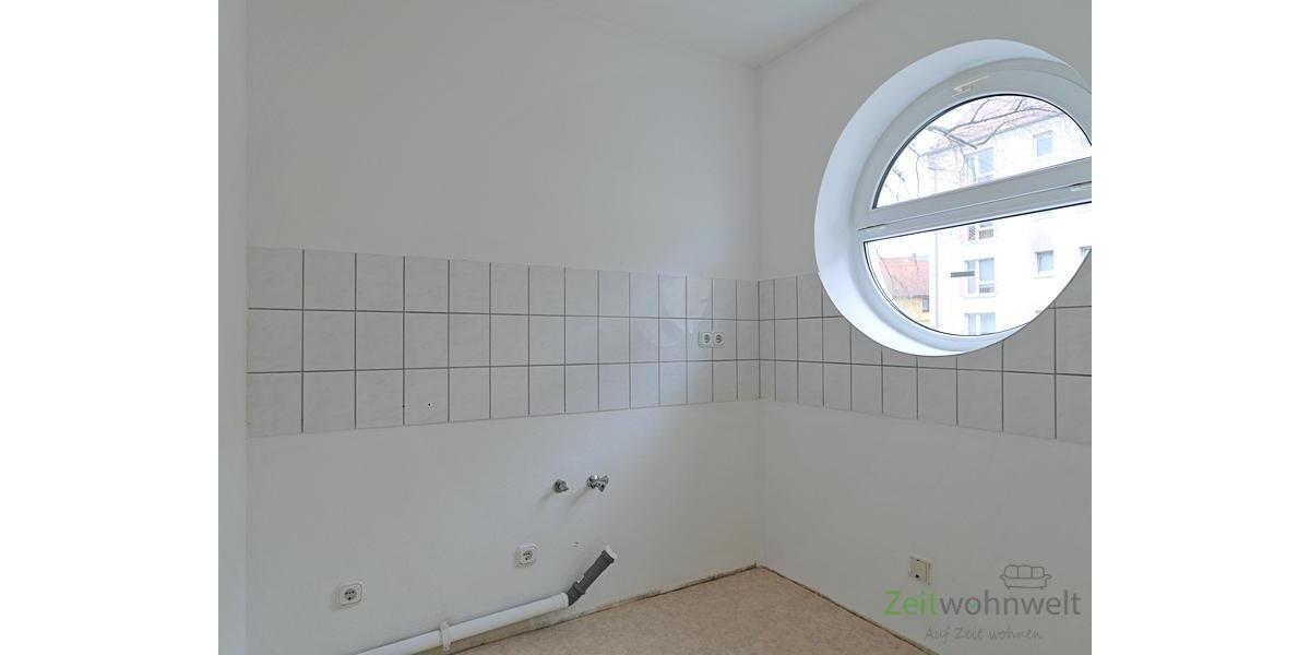 Küche mit rundem Fenster