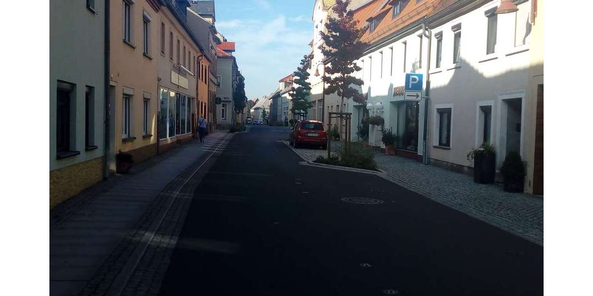 vor dem Objekt