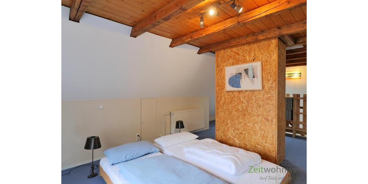 zwei Betten im Dach
