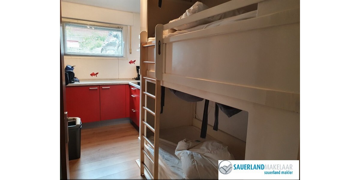 Küche mit Etagenbett