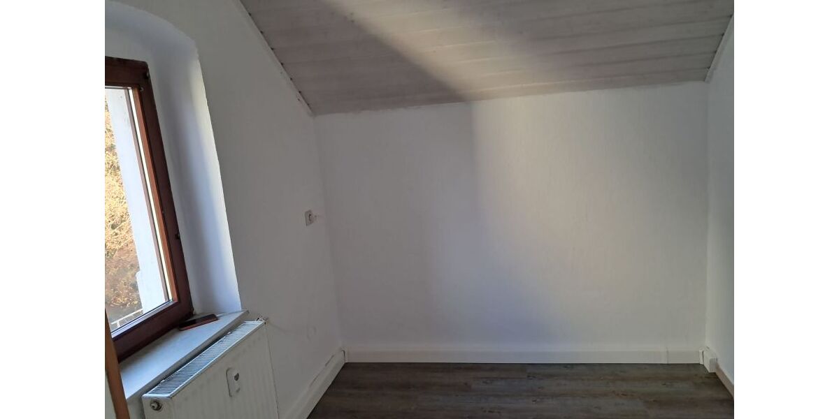 Küchenbereich mit anschließendem Esszimmer