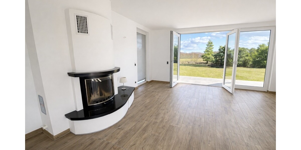 Kamin - Wohnbereich in Blick in Richtung Garten